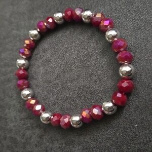Handmade faceted ruby red and silver beads Stretch bracelet